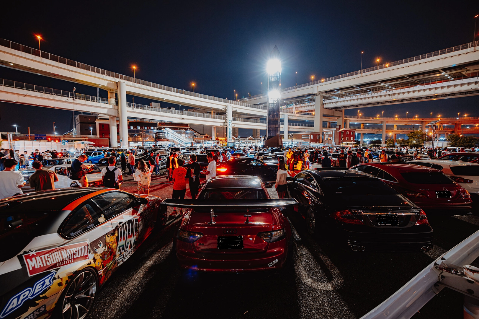 Daikoku PA parking area Tokyo filled with JDM cars at night